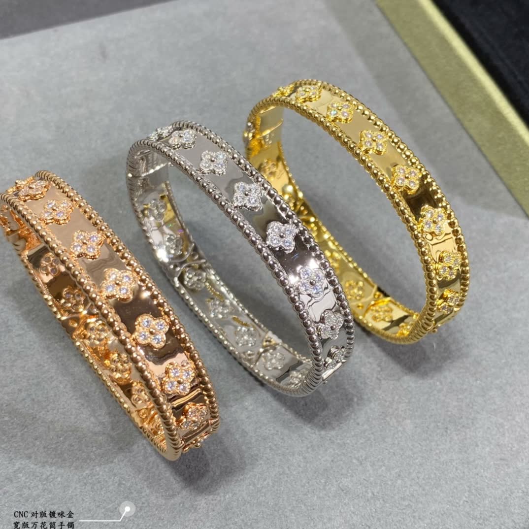 Van Cleef & Arpels Gold and Silver Flower Pattern Bracelets